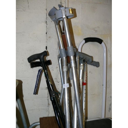 343 - SELECTION OF WALKING STICKS, CRUTCHES AND FOLDING SEAT