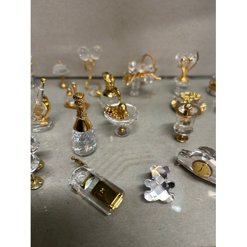 3 - AN IMPRESSIVE COLLECTION OF MOSTLY SWAROVSKI MINIATURES TO INCLUDE A MICROSCOPE, GRAMOPHONE, CHAMPAG... 