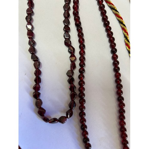 27 - 2 VINTAGE NECKLACES WITH BARREL CLASPS PROBABLY GARNET AND ANOTHER MODERN NECKLACE WITH UNUSUAL ROPE... 