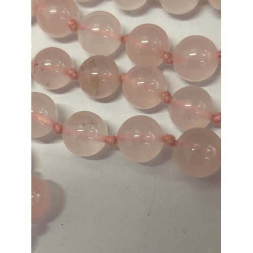 28 - A ROSE QUARTZ BEAD NECKLACE - 30 INCHES