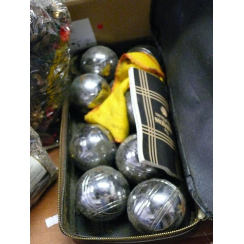 196 - SET OF 4 BOULES IN A CASE PLUS A FURTHER SET OF 8 IN A LEATHER BAG