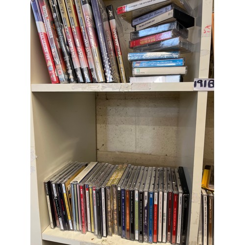 191B - 4 CUBES OF CDS, DVDS AND CASSETTES, MANY NEW