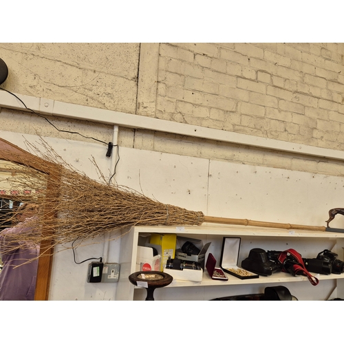 83 - LARGE BROOMSTICK WITH WOODEN HANDLE