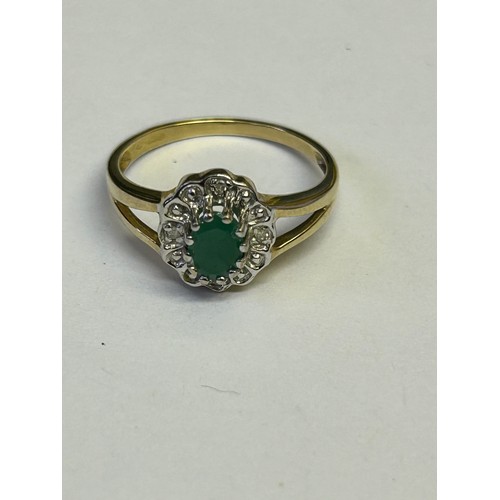 11 - A 9ct GOLD ENGAGMENT RING WITH GREEN GARNET AND DIAMOND SIZE L WEIGHT 1.67gr