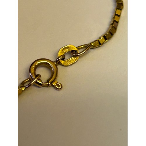 31 - A 9ct GOLD LONG CHAIN 24 INCHES AND PENDANT REAL SOUTH SEA PEARL IN A CAGE WEIGHT 9gr