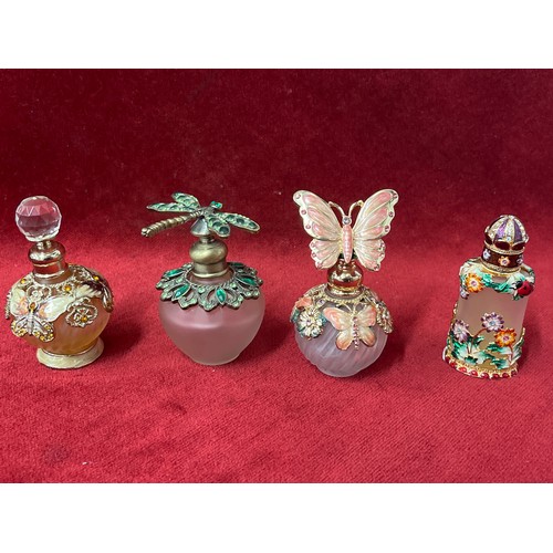 1 - 4 VERY DECORATIVE PERFUME BOTTLES WITH ENAMEL AND COLOURED GLASS DETAIL. INCLUDES A DRAGONFLY AND BU... 