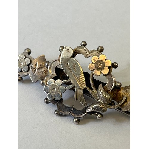 35C - A SILVER BROOCH WITH FLOWERS AND A LITTLE BIRD BIRMINGHAM 1904 BY H&W