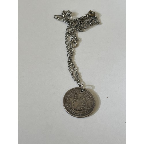 53 - A SOLID SILVER VICTORIAN 1 SHILLING 1887 ON A CHAIN