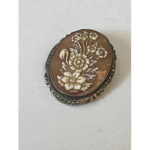 57 - A 800 SILVER SHELL CAMEO BROOCH HAND CARVING OF FLOWERS VERY LOVELY THE FRAME WITH MARCASITE ALL ARO... 