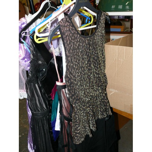 379 - QUANTITY OF GOOD QUALITY LADIES DRESSES AND FANCY DRESS CLOTHING