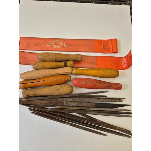 74A - an original box of vintage triangerlar various sizes files with handles made by nicholson file co of... 