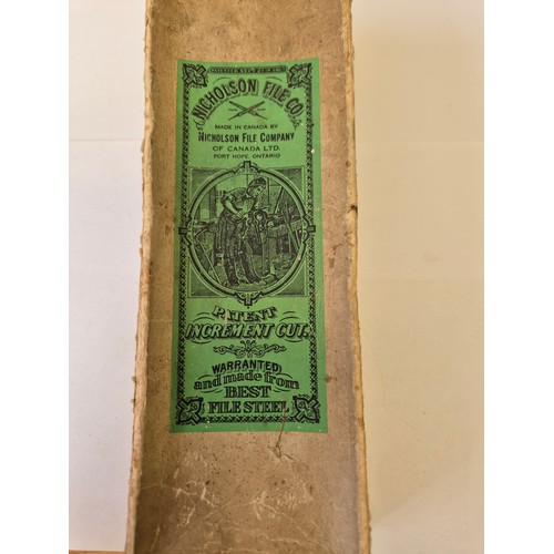 74A - an original box of vintage triangerlar various sizes files with handles made by nicholson file co of... 