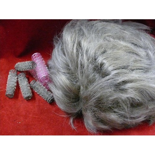 124 - VINTAGE WIG ON POLYSTYRENE  HEAD IN A CARRY CASE,