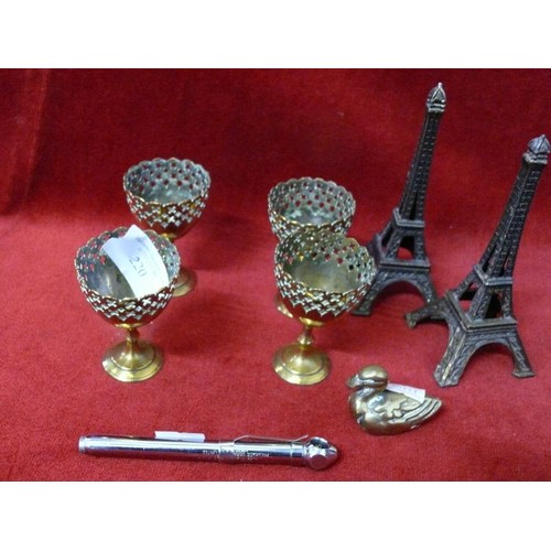 220 - COLLECTION OF DECORATIVE METALWARE 4 MINIATURE BRASS GOBLETS, BRASS DUCK AND 2 EIFEL TOWERS