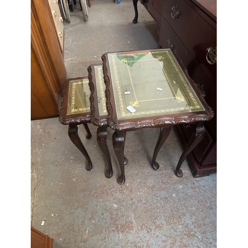 351 - NEST OF 3 TABLES WITH GREEN LEATHER AND GLASS TOPS