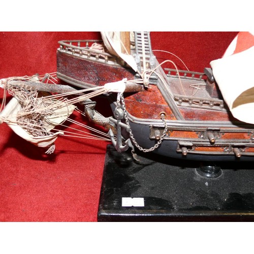 65 - WOODEN MODEL OF A GALLEON ON STAND