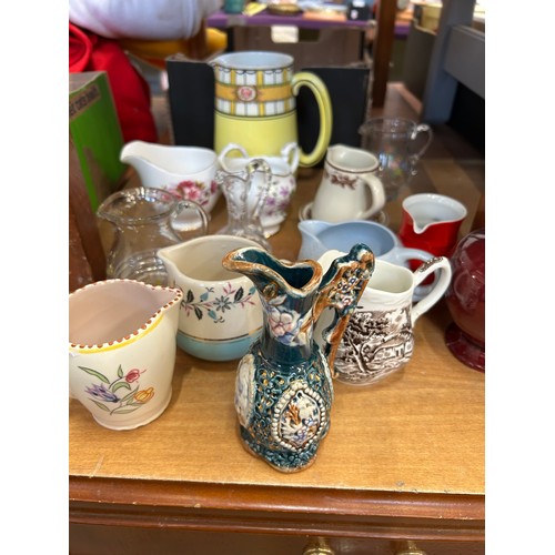 229 - COLLECTION OF ANTIQUE AND VINTAGE CERAMIC AND GLASS JUGS