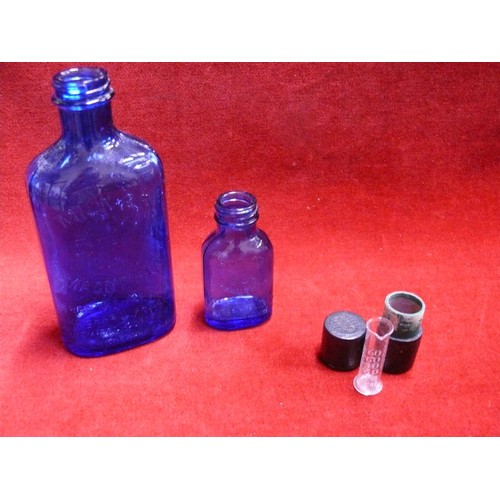 52 - SLIPPER BED PAN TOGETHER WITH TWO MILK OF MAGNESIA BLUE BOTTLES & AN ANTIQUE MINIM MEASURE IN LEATHE... 