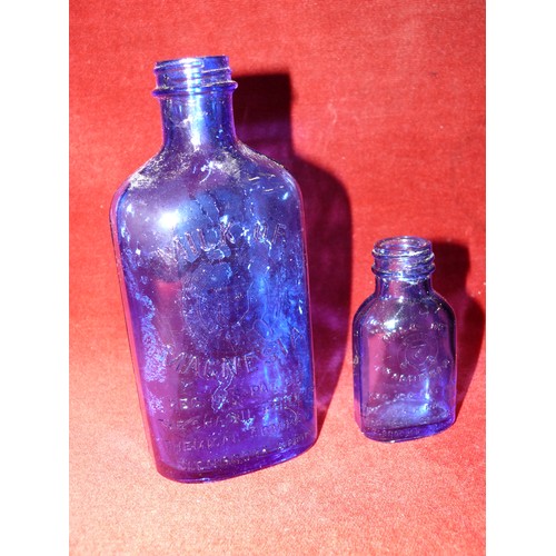 52 - SLIPPER BED PAN TOGETHER WITH TWO MILK OF MAGNESIA BLUE BOTTLES & AN ANTIQUE MINIM MEASURE IN LEATHE... 