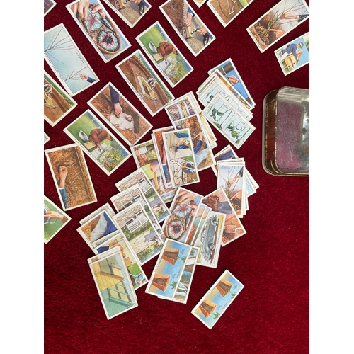 89 - Tin of cigarette cards - Household & Garden hints collection, approx 80.