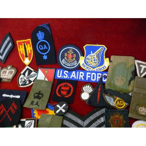 105 - NICE COLLECTION OF MILITARY CLOTH BADGES