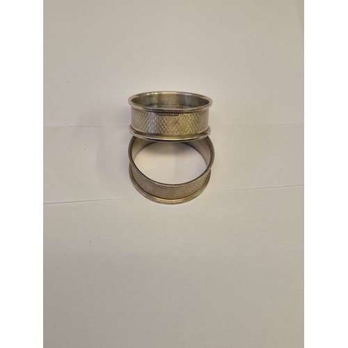 18 - A PAIR OF SILVER NAPKIN RINGS BIRMINGHAM 1981 BY W I Broadway & Co