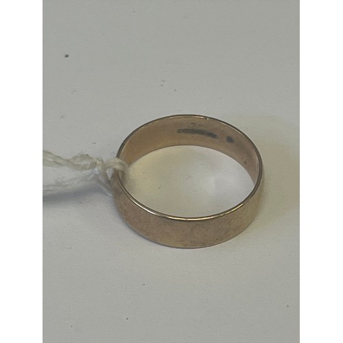 11 - A LARGE SIZE 9CT GOLD WEDDING BAND SIZE W WEIGHT 4.26GR