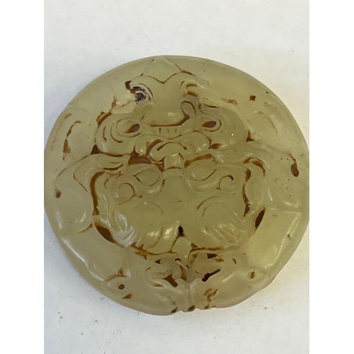 34 - A CERTIFIED CHINESE BOWENITE JADE ROUNDELL