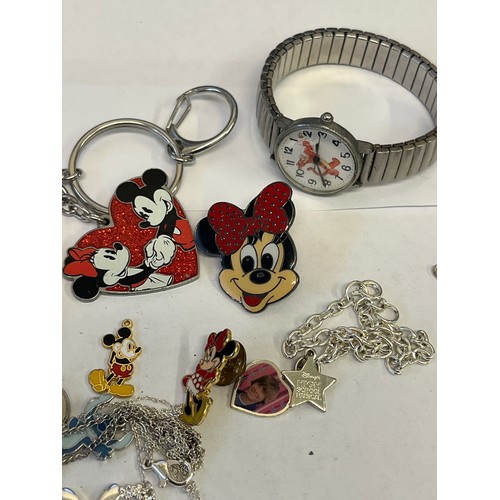 36 - A COLLECTION OF DISNEY PRODUCTS,  BADGES,  KEYRINGS,  EARRINGS