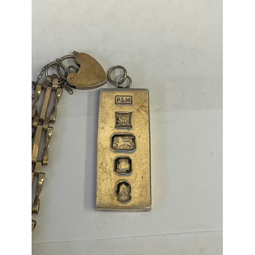 31 - A SILVER COLLECTION CONSISTING OF  1 OUNCE INGOT,  A LARGE LOCKET AND CHAIN,  A BANGLE BRACELET AND ... 