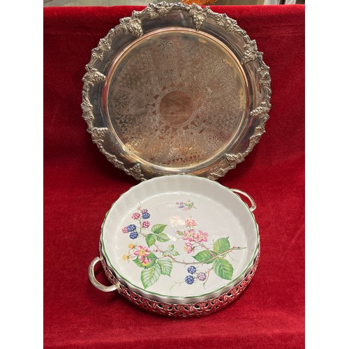 51 - A LARGE S/PLATE DECORATIVE SERVING TRAY AND CHINA SERVING DISH IN S/PLATE CRADLE