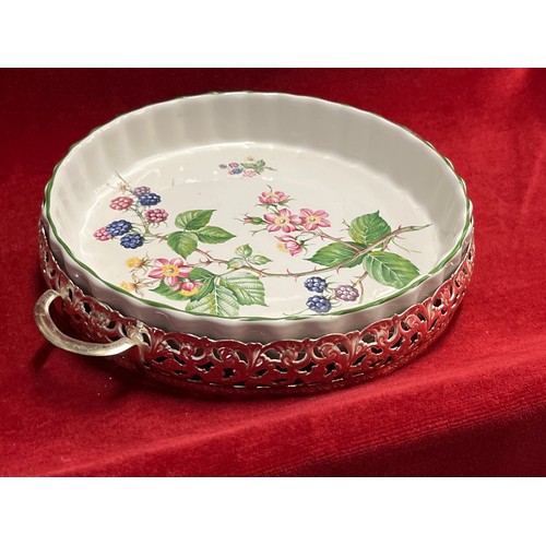 51 - A LARGE S/PLATE DECORATIVE SERVING TRAY AND CHINA SERVING DISH IN S/PLATE CRADLE