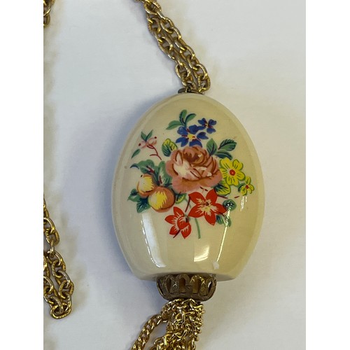 17A - A CERAMIC VINAIGRETTE / POMANDER ON GOLD METAL CHAIN REFILLABLE FROM BASE
