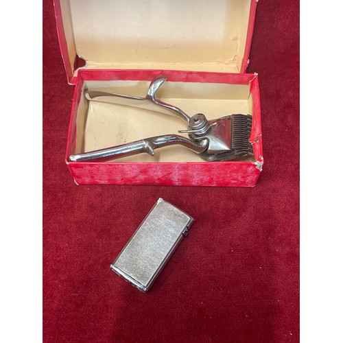 46 - VINTAGE DORKO HAIR CLIPPERS AND A LIGHTER