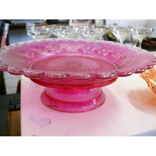 197 - LARGE PINK GLASS CAKE STAND BY PAPERCHASE PLUS A CARNIVAL GLASS BOWL