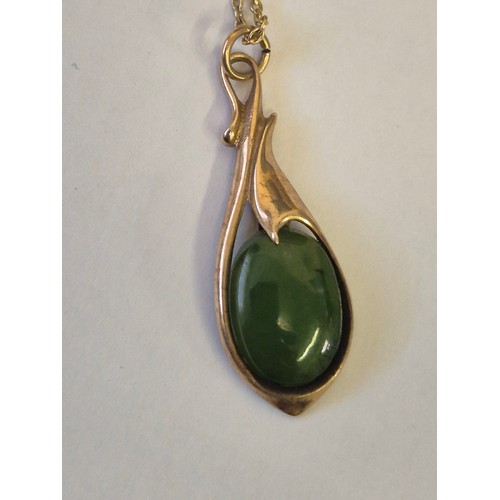 52 - A 9CT GOLD AND JADE PENDANT ON GOLD CHAIN 3.20GR
