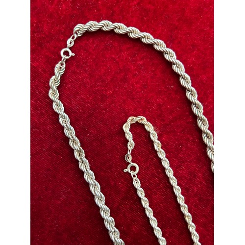 38 - A 925 STERLING SILVER ROPE TWIST NECKLACE (18 INCHES)  AND A MATCHED SILVER BRACELET