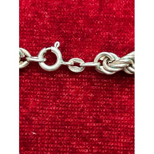 38 - A 925 STERLING SILVER ROPE TWIST NECKLACE (18 INCHES)  AND A MATCHED SILVER BRACELET