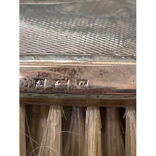 10 - STERLING SILVER 3 PIECE DRESSING TABLE SET OF MIRROR AND 2 BRUSHES. ENGINE TURNED DECORATION WITH 