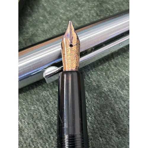 31 - A Platignum fountain pen with 14ct gold nib and a vintage Cunard White Star Line “Aquitania” pencil.