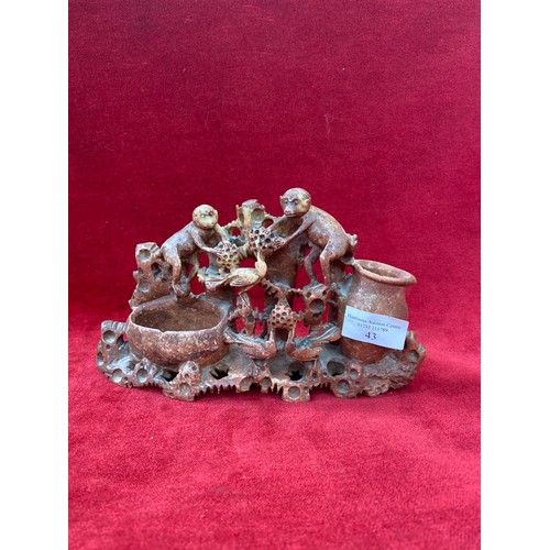 43 - Chinese carved soapstone sculpture featuring monkeys and birds among foliage. Reddish-brown hue, wit... 
