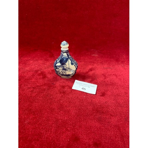 46 - Chinese porcelain blue and white snuff bottle, decorated with erotic scenes on each side and complet... 