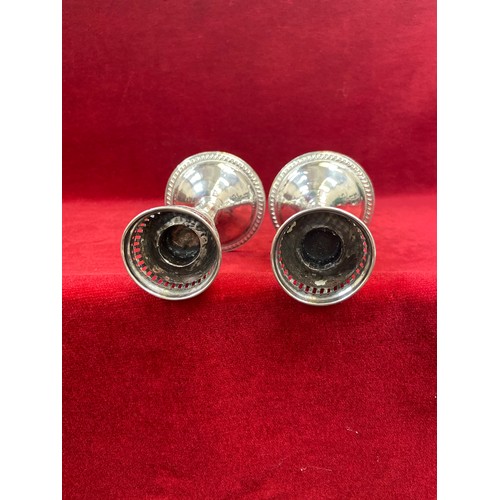 59 - Pair of mid 20th Century American sterling silver candlesticks by the Duchin Silver Company of New Y... 