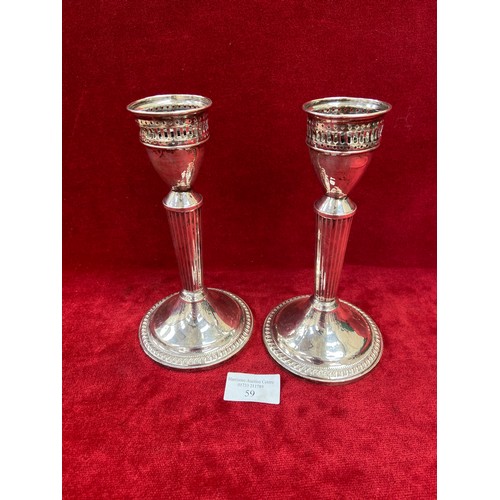 59 - Pair of mid 20th Century American sterling silver candlesticks by the Duchin Silver Company of New Y... 