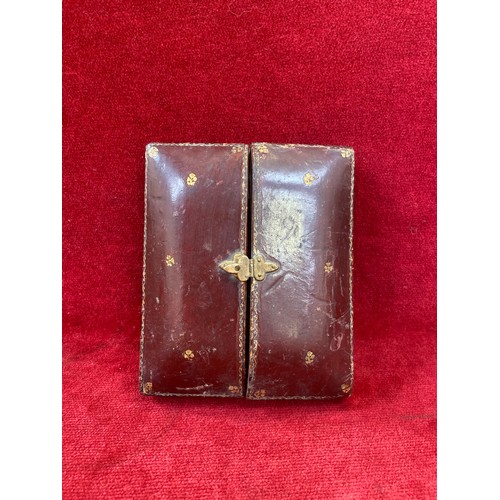 62 - Antique red leather portrait miniature case marked 