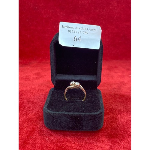 64 - A Vintage 18ct gold ring in crossover design platinum setting with two diamonds. Size L 2.2 grams