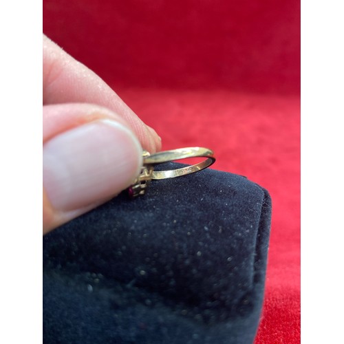 65 - A beautiful vintage 9ct gold dress ring set with a large pearl surrounded by 12 rubies. London hallm... 