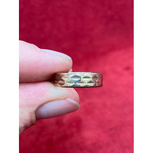 71 - A vintage 9ct gold faceted band ring, Birm hallmark 1969, size M, 3.5 grams