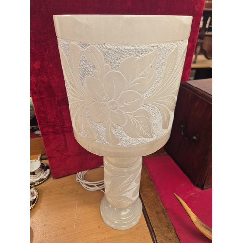 115 - Large alabaster table lamp, carved with art nouveau floral details around the cylinder shade and ste... 