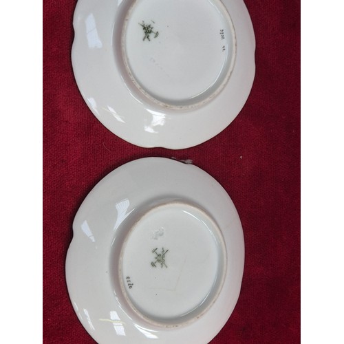 120 - A pair of pretty antique coffee cans and saucers, with hand painted floral and gilt decoration, the ... 